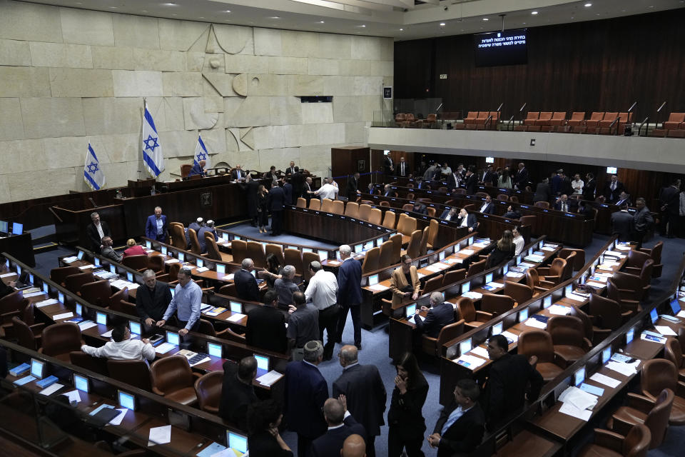 Israeli lawmakers are gathered for a vote on picking two lawmakers to serve on a judge selection panel, in the Knesset, Israel's parliament, Jerusalem, Wednesday, June 14, 2023. (AP Photo/Ohad Zwigenberg)