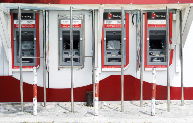 Damaged ATM cash machines are pictured in the Lekki district of the commercial capital Lagos