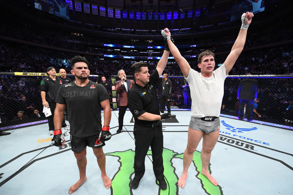 NEW YORK, NEW YORK - NOVEMBER 02: (R-L) Darren Till of England celebrates his victory over Kelvin Gastelum in their middleweight bout during the UFC 244 event at Madison Square Garden on November 02, 2019 in New York City. (Photo by Josh Hedges/Zuffa LLC via Getty Images)