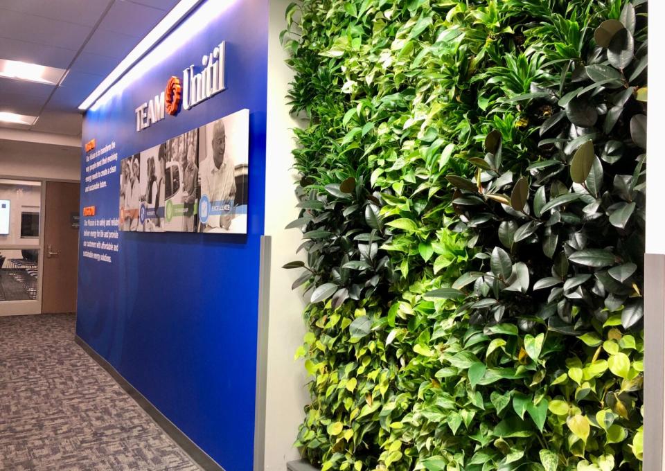Unitil’s Seacoast Operations Center is the first building in New Hampshire to achieve WELL certification. Pictured is one of several live plant walls in the building.