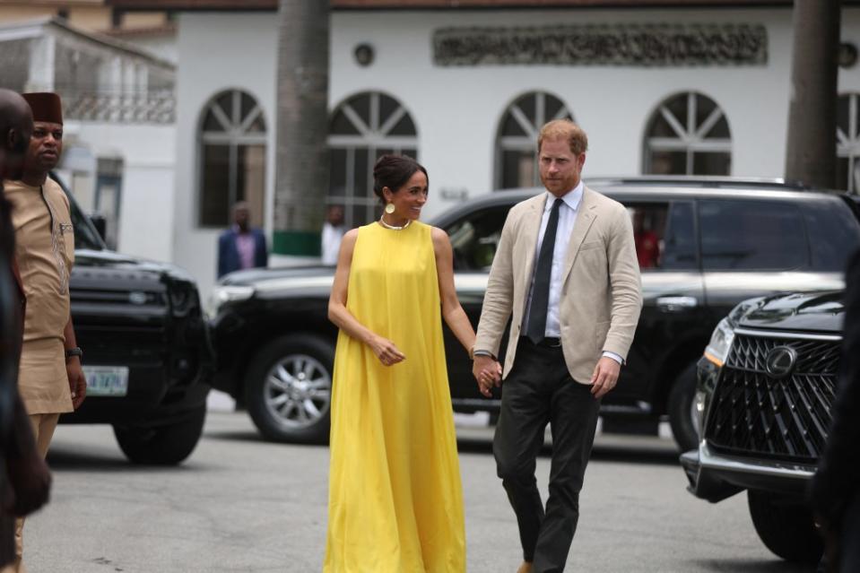 Meghan Markle and Prince Harry in Nigeria. AFP via Getty Images