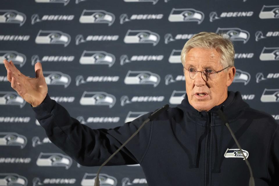 Seattle Seahawks head coach Pete Carroll gestures during a news conference after a practice session in Munich, Germany, Thursday, Nov. 10, 2022. The Tampa Bay Buccaneers are set to play the Seattle Seahawks in an NFL game at the Allianz Arena in Munich on Sunday. (AP Photo/Matthias Schrader)