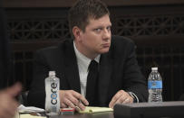 Chicago Police Officer Jason Van Dyke listens during his trial for the shooting death of Laquan McDonald at the Leighton Criminal Court Building, Monday, Sept. 17, 2018 in Chicago. McDonald died during a confrontation with Van Dyke on Oct. 20, 2014, in Chicago. (Antonio Perez/ Chicago Tribune via AP, Pool)