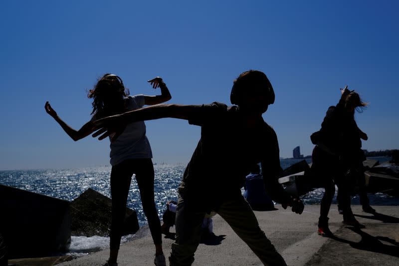 People join socially-distant silent disco in Barcelona