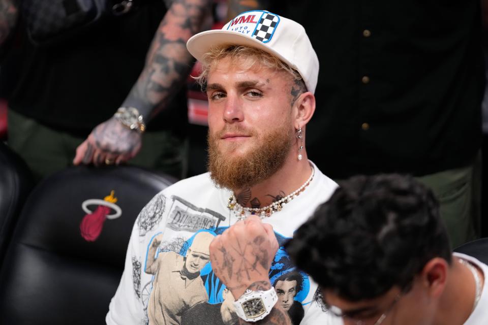 Jake Paul watches a game between the Miami Heat and the New York Knicks during Game 3 of the 2023 NBA playoffs on at Kaseya Center in Miami, Fla. on May 6, 2023.