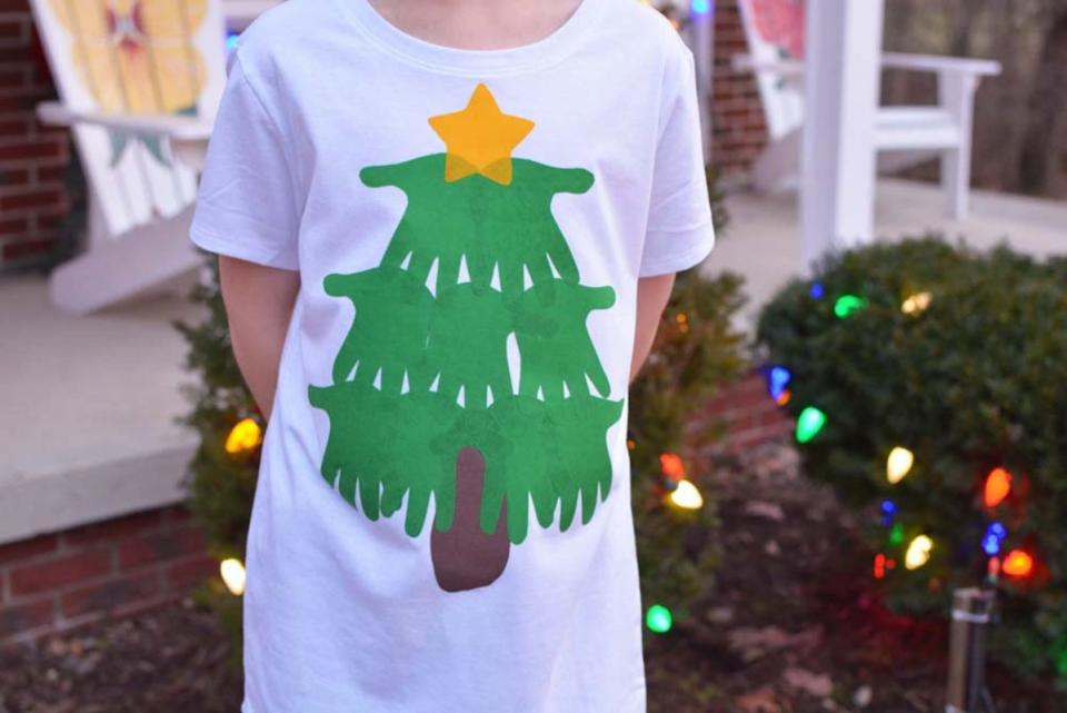 <p>Growing Up Gabel</p><p>This craft might just become your kid’s favorite new shirt! Follow the steps at <em><a href="https://growingupgabel.com/diy-handprint-christmas-tree-t-shirt/" rel="nofollow noopener" target="_blank" data-ylk="slk:Growing Up Gabel;elm:context_link;itc:0;sec:content-canvas" class="link ">Growing Up Gabel</a></em> to see how they can make one for themselves.</p>