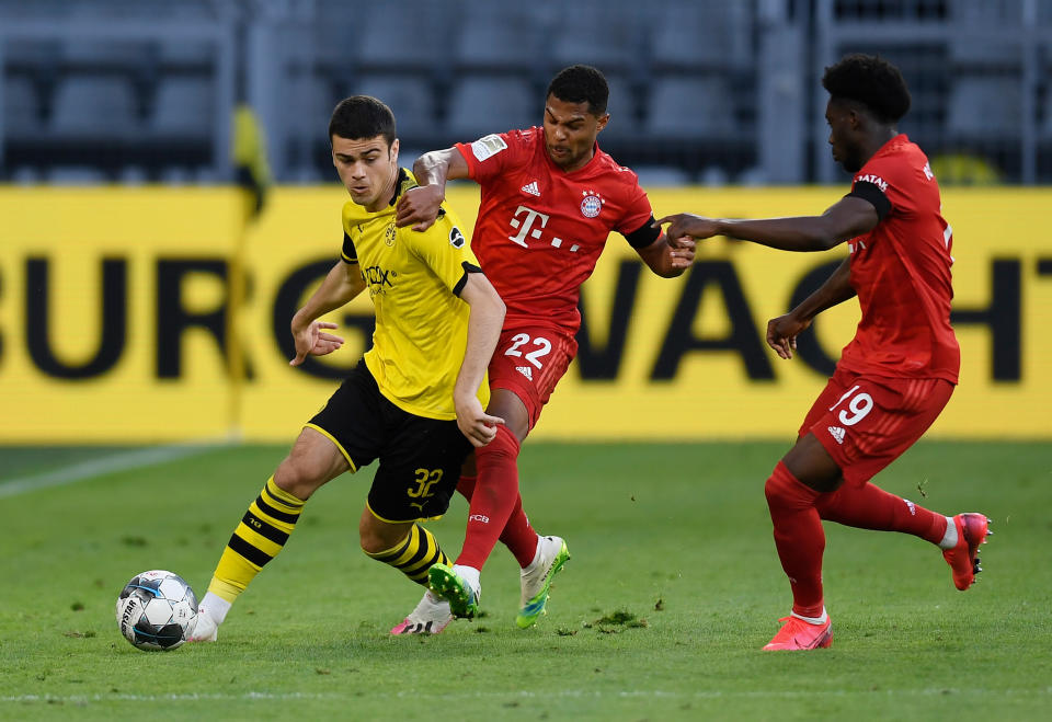 Giovanni Reyna (left) came on in the second half of Borussia Dortmund's 1-0 loss to Bayern Munich on Tuesday. (Alexandre Simoes/Getty Images)