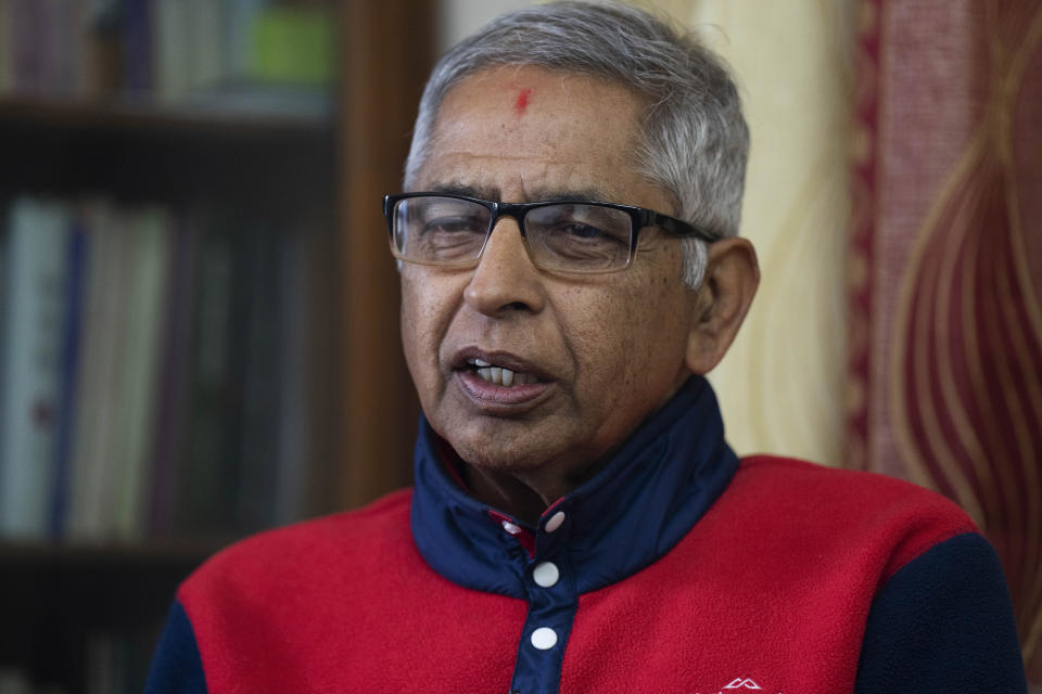 Dhruba Hari Adhikary, an independent analyst speaks to the Associated Press at his residence in Kathmandu, Nepal, Feb. 26, 2024. Royalist groups and supporters of former King Gyanendra have been holding rallies to demand the restoration of the monarchy and the nation’s former status as a Hindu state. Adhikary says it is not likely the king would be reinstated any time soon. (AP Photo/Niranjan Shrestha)