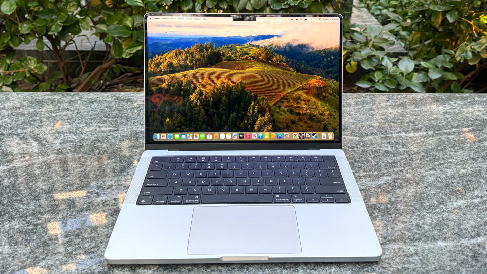 MacBook Pro 14-inch M3 on marble bench showing display