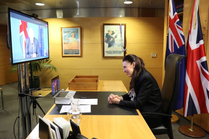 New Zealand's Prime Minister Jacinda Ardern speaks with Britain's Prime Minister Boris Johnson over video conferencing as they seal a free trade deal