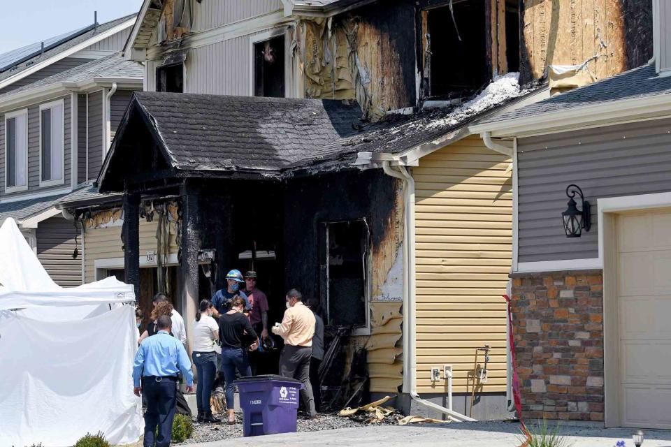 Thomas Peipert/AP/Shutterstock Denver house fire