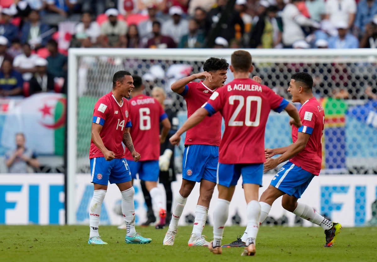 Costa Rican players during their win over Japan  (AP)