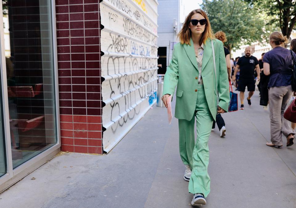 <h1 class="title">In an Acne Studios suit</h1><cite class="credit">Photographed by Phil Oh</cite>