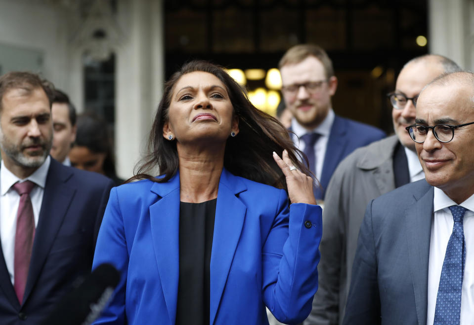 Anti-Brexit campaigner Gina Miller speaks outside the Supreme Court in London, Tuesday, Sept. 24, 2019 after it made it's decision on the legality of Prime Minister Boris Johnson's five-week suspension of Parliament. In a setback for Johnson, Britain's Supreme Court has ruled that the suspension of Parliament was illegal. The ruling Tuesday is a major blow to the prime minister who had suspended Parliament for five weeks, claiming it was a routine closure. (AP Photo/Frank Augstein)
