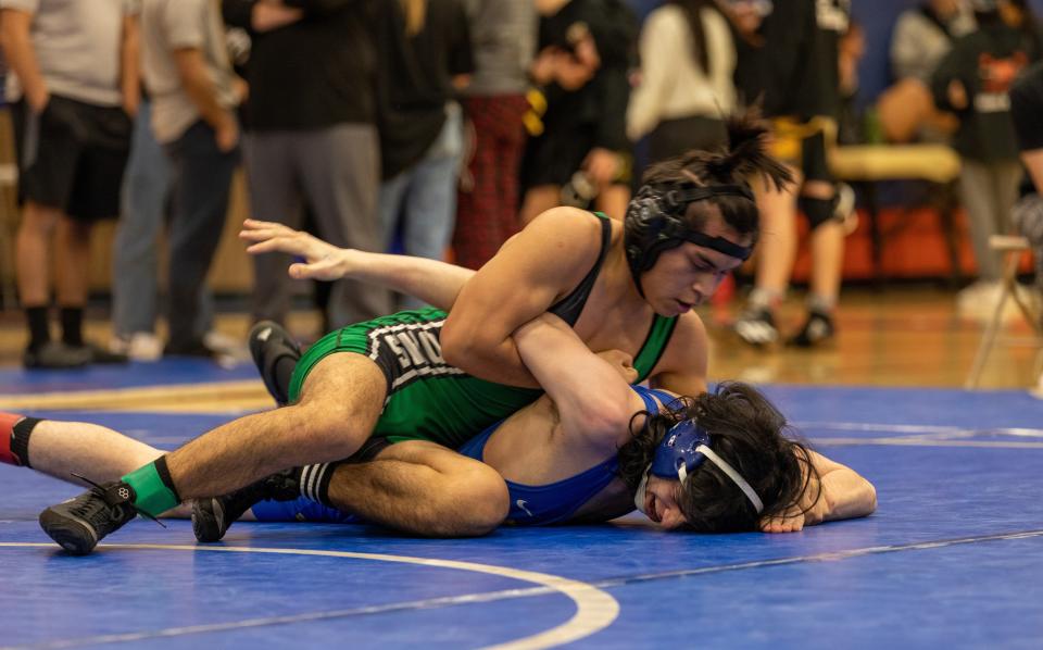 Will Ramos of Thousand Oaks has Lucas Blahosky of Agoura pinned facedown in the final of the 132-pound division at the Marmonte League wrestling finals on Friday at Westlake High. Ramos won the match to capture the league title.