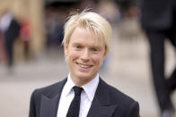 Freddie Fox poses for photographers upon arrival at the Olivier Awards on Sunday, April 14, 2024, in London. (Photo by Vianney Le Caer/Invision/AP)