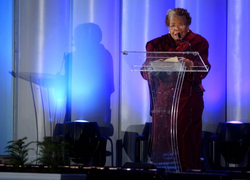 Poet Maya Angelou, who died on this day in 2014, reads a poem during the 2005 Pageant of Peace and National Christmas Tree lighting on the Ellipse near the White House in Washington on December 1, 2005. File Photo by Roger L. Wollenberg/UPI