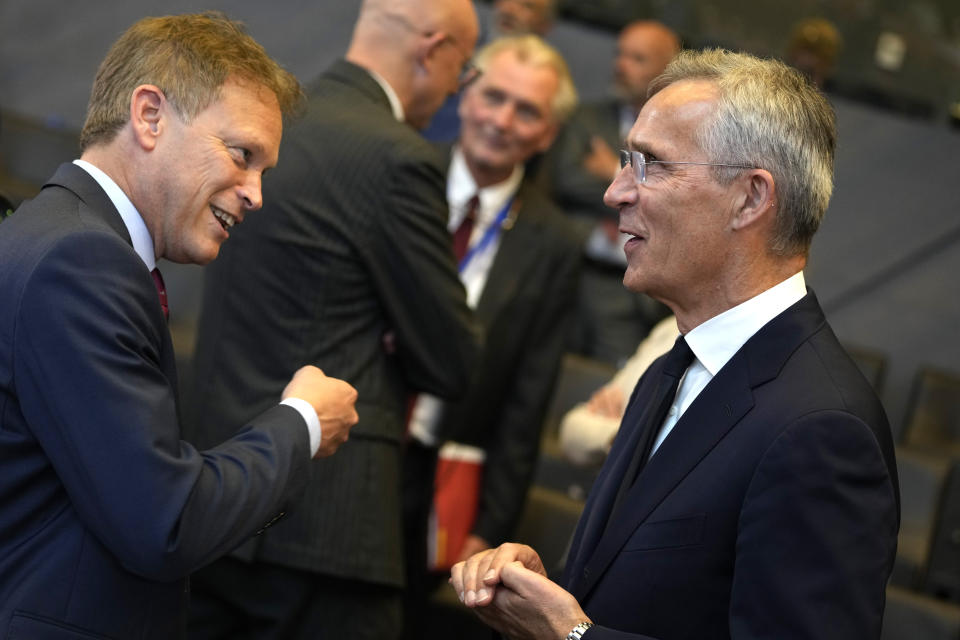 NATO Secretary General Jens Stoltenberg, right, speaks with British Defense Secretary Grant Shapps prior to a meeting of the NATO-Ukraine Council at NATO headquarters in Brussels, Wednesday, Oct. 11, 2023. Ukraine's President Volodymyr Zelenskyy and Ukraine's Defense Minister Rustem Umerov arrived at NATO for meetings with alliance defense ministers to further drum up support for Ukraine's fight against Russia. (AP Photo/Virginia Mayo)