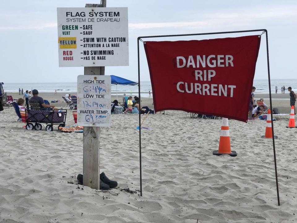 Warnings about rip currents are seen posted at the entrance of Ogunquit Beach Thursday, July 27, 2023.