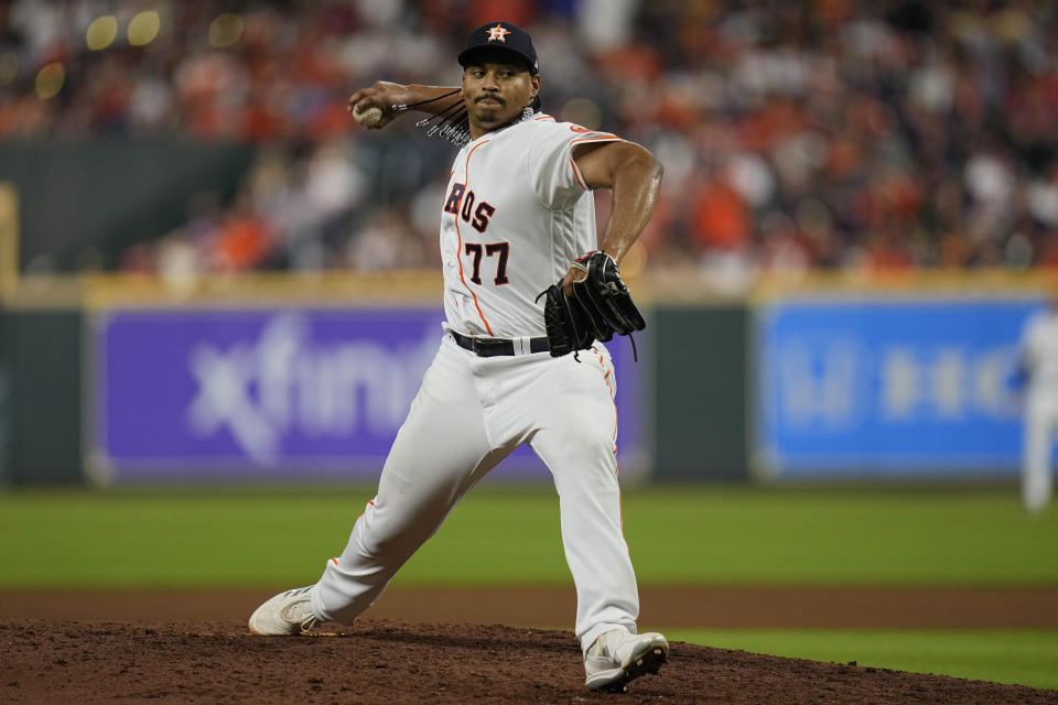 Houston Astros starting pitcher Luis Garcia throws during the 10th inning in Game 1 of baseball's World Series between the Houston Astros and the Philadelphia Phillies on Friday, Oct. 28, 2022, in Houston. (AP Photo/Eric Gay)