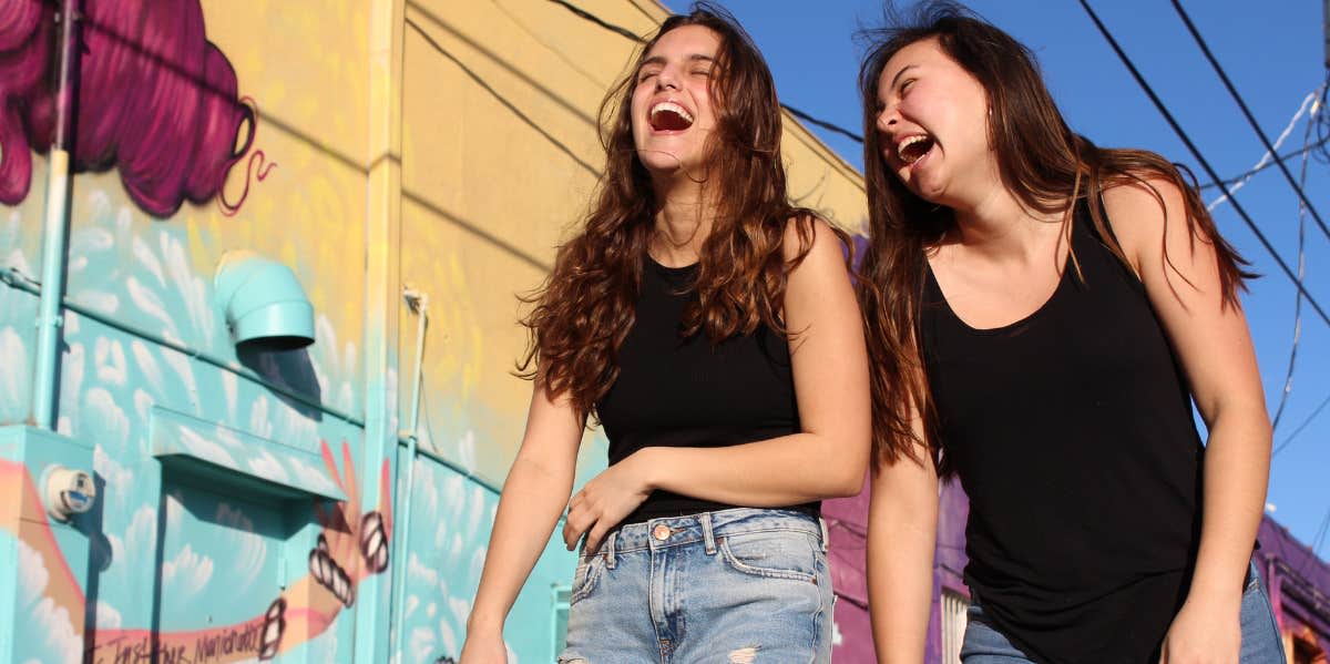 two women laughing