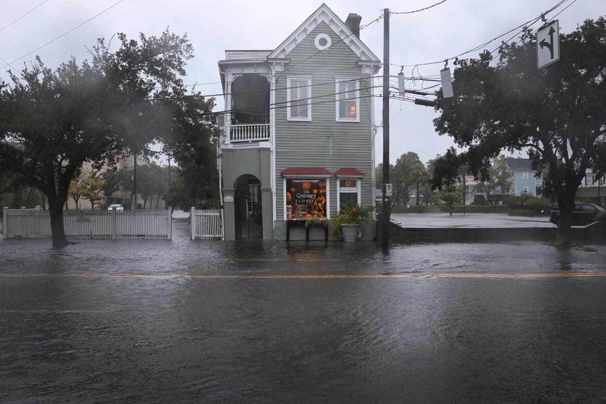 Rain from Hurricane Ian floods a street on September 30, 2022 in Charleston, South Carolina. Ian hit Florida as a category 4 storm before crossing over into the Atlantic and is now hitting South Carolina as a category 1 storm near Charleston.