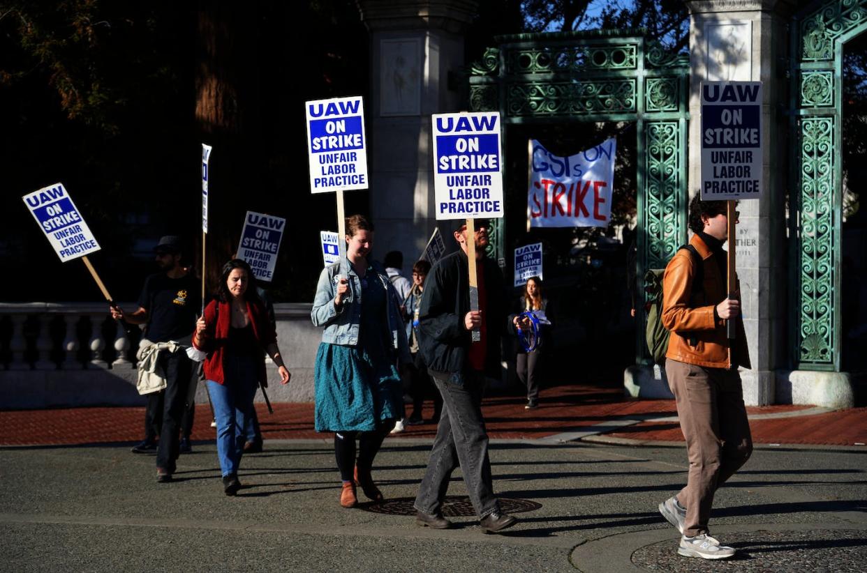 Research suggests labour strikes at universities get scant media coverage, both in Canada and the United States. In this December 2022 photo, graduate student instructors and researchers picket at University of California, Berkeley. (AP Photo/Terry Chea)