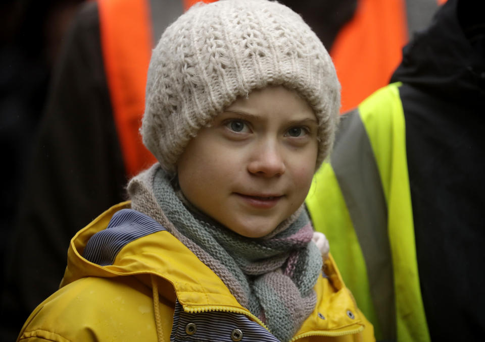 FILE - In this Friday, Feb. 28, 2020 file photo, climate activist Greta Thunberg, from Sweden marches with other demonstrators as she participates in a school strike climate protest in Bristol, south west England. The Norwegian Nobel committee will announce the winner of the 2020 Nobel Peace Prize on Friday Oct. 9, 2020. The announcement is anticipated as a chance to impart hope at a time when the world faces numerous disruptions, including the coronavirus pandemic, accelerating climate change, and threats to democratic governance. (AP Photo/Matt Dunham, File)