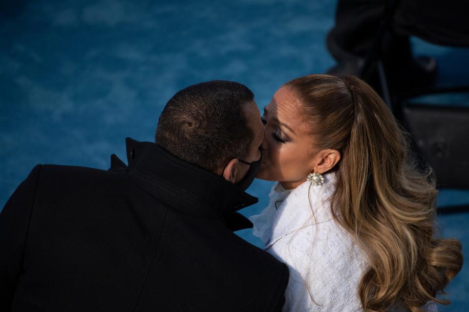 Jennifer Lopez kisses then-fiancé Alex Rodriguez after performing during the inauguration of U.S. President-elect Joe Biden on January 20, 2021 in Washington, DC.