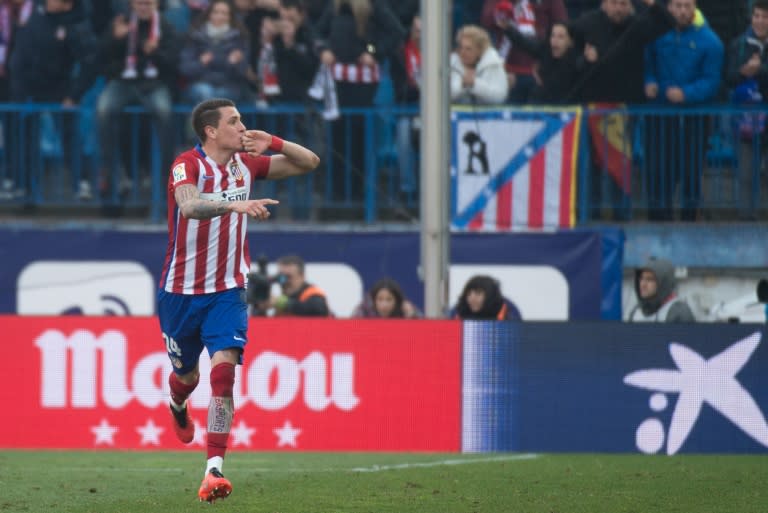 Atletico Madrid's midfielder Gabi celebrates after scoring during the Spanish league football match Club Atletico de Madrid vs SD Eibar at the Vicente Calderon stadium in Madrid on February 6, 2016