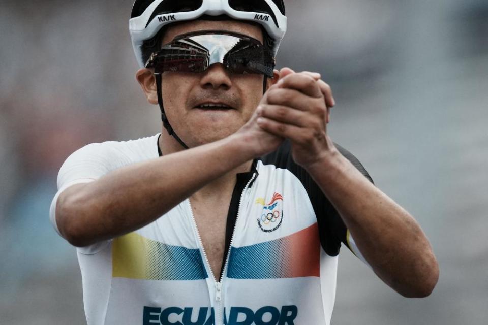 Richard Carapaz of Ecuador celebrates after winning the gold medal during the men’s cycling road race.