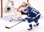 Philadelphia Flyers goaltender Carter Hart (79) makes a save on Tampa Bay Lightning left wing Alex Killorn (17) during the first period of an NHL hockey playoff game Saturday, Aug. 8, 2020, in Toronto. (Frank Gunn/The Canadian Press via AP)