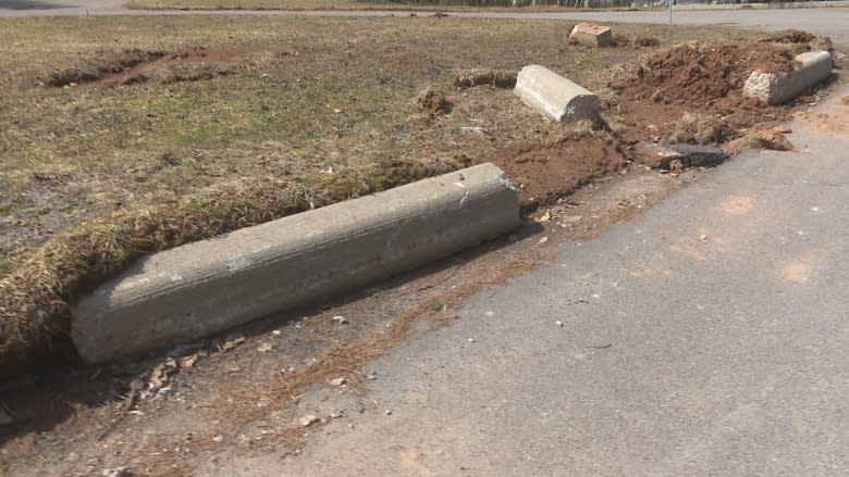 Cruel April, clad in scars of winter: Melt reveals snowplow damage