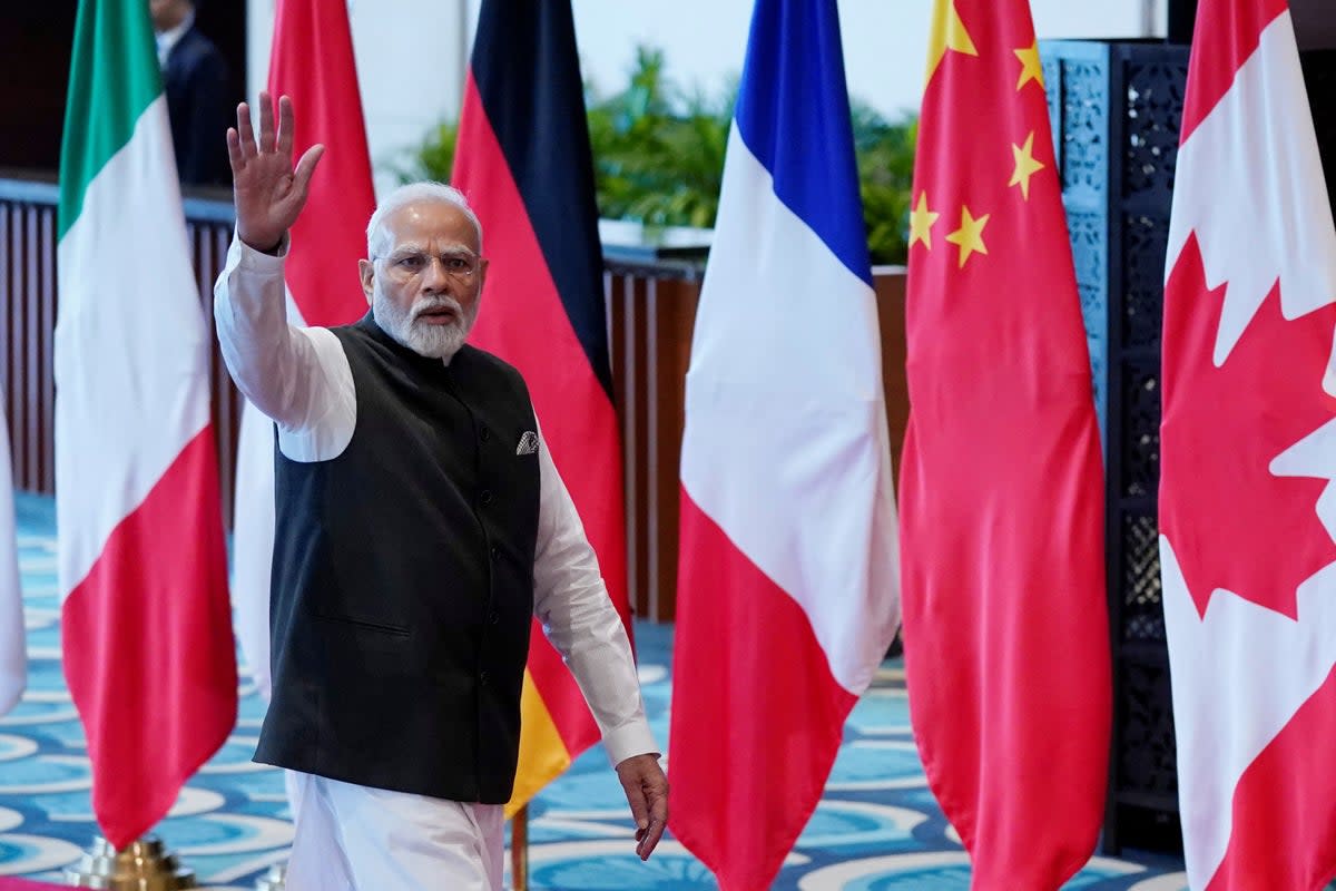 Indian prime minister Narendra Modi waves as he arrives at Bharat Mandapam convention centre for the G20 Summit, in New Delhi, India (via REUTERS)