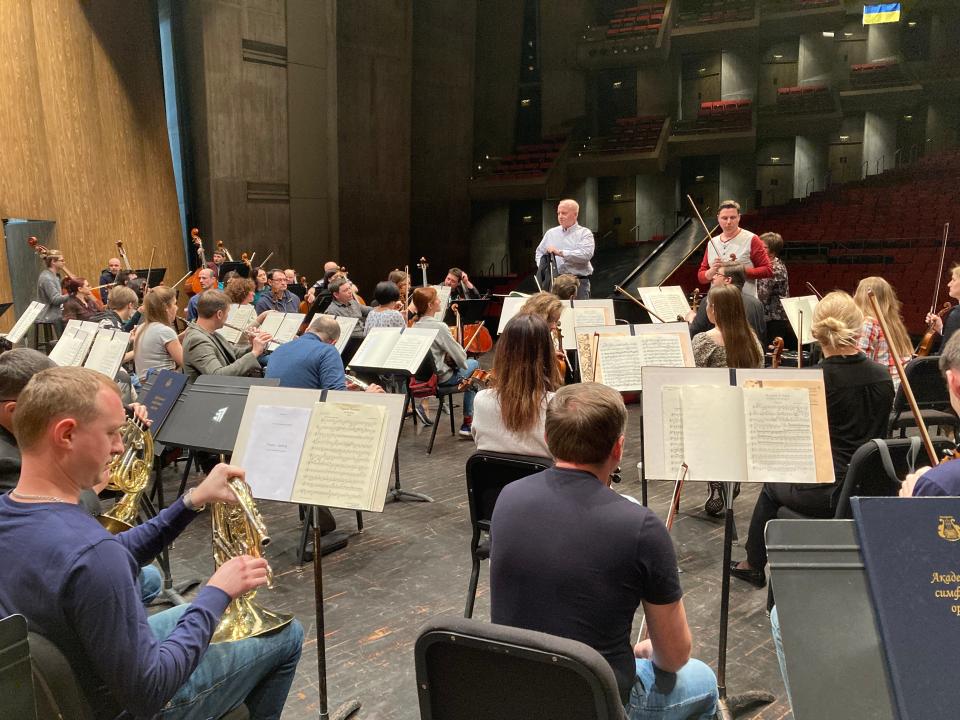 Conductor Theodore Kuchar, standing at left, leads the Lviv National Philharmonic Orchestra of Ukraine during pre-concert rehearsal at Stephens Auditorium in Ames on Friday, March 3, 2023. The show was the orchestra's last stop on a U.S. tour that began in January.