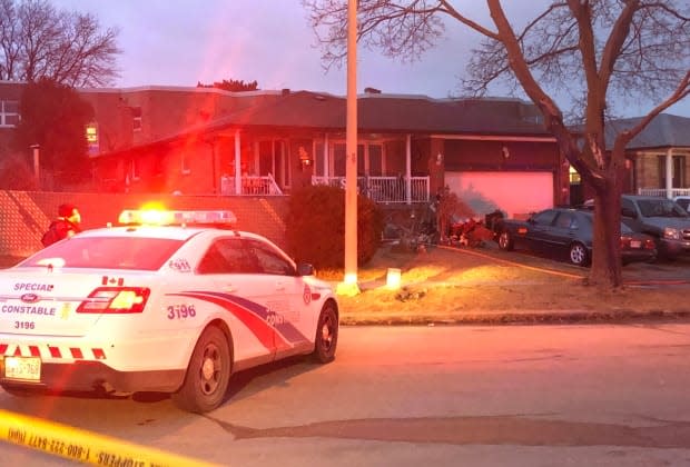 There was heavy smoke and flames when emergency crews arrived at the home, police said. (Linda Ward/CBC - image credit)