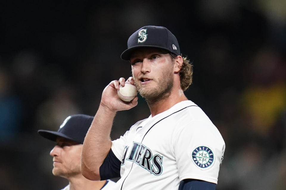 Seattle Mariners relief pitcher Drew Steckenrider waits to be pulled from the baseball game, having given up a three-run double to Boston Red Sox's Kyle Schwarber during the eighth inning of a baseball game Tuesday, Sept. 14, 2021, in Seattle. (AP Photo/Elaine Thompson)