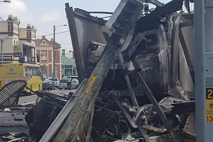 A destroyed bus shelter lays in pieces. Source: Facebook / Clifton Brett