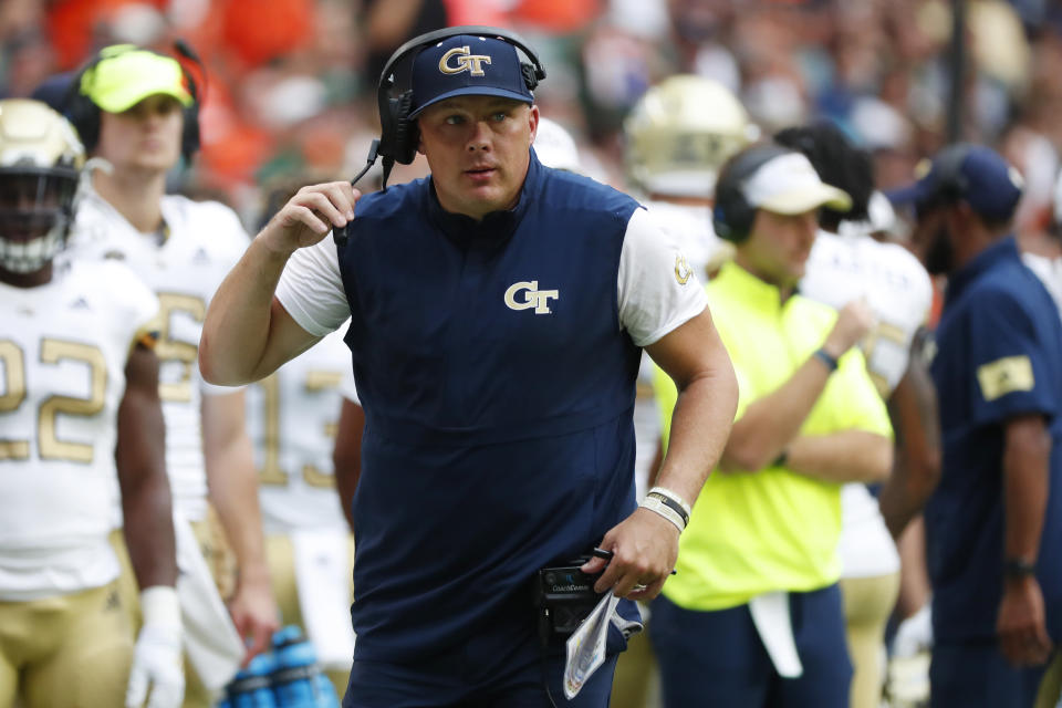 FILE - In this Saturday, Oct. 19, 2019, file photo, Georgia Tech head coach Geoff Collins is shown during the first half of an NCAA college football game against Miami, in Miami Gardens, Fla. Collins said his field goal unit normally runs eight live repetitions twice a week at practice, but he shortened those drills in a nod to social distancing amid the coronavirus pandemic. (AP Photo/Wilfredo Lee, File)