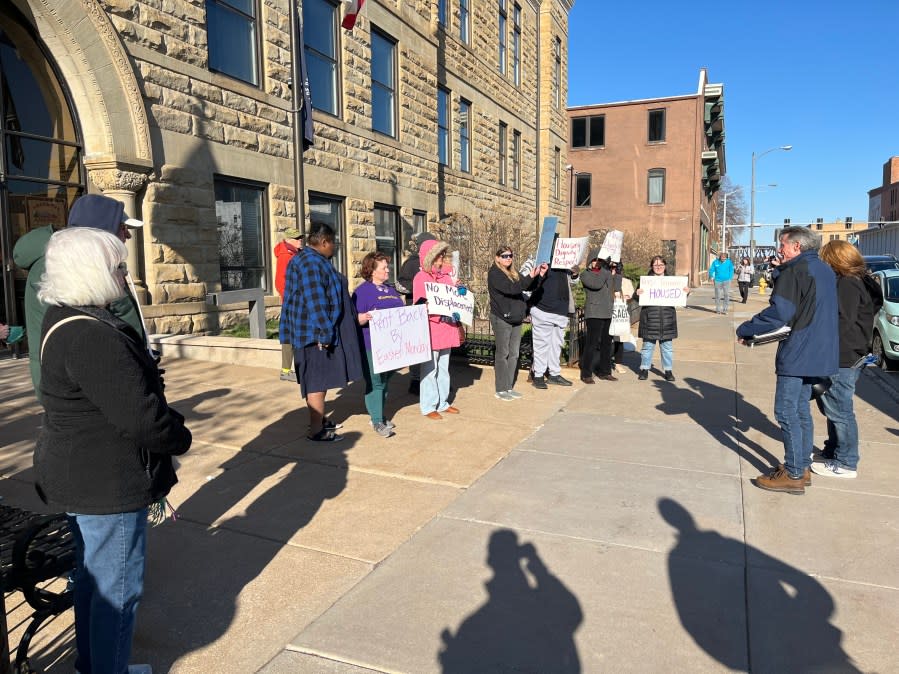 Protestors outside Davenport City Hall on March 27. (Michael Frachalla, OurQuadCities.com)