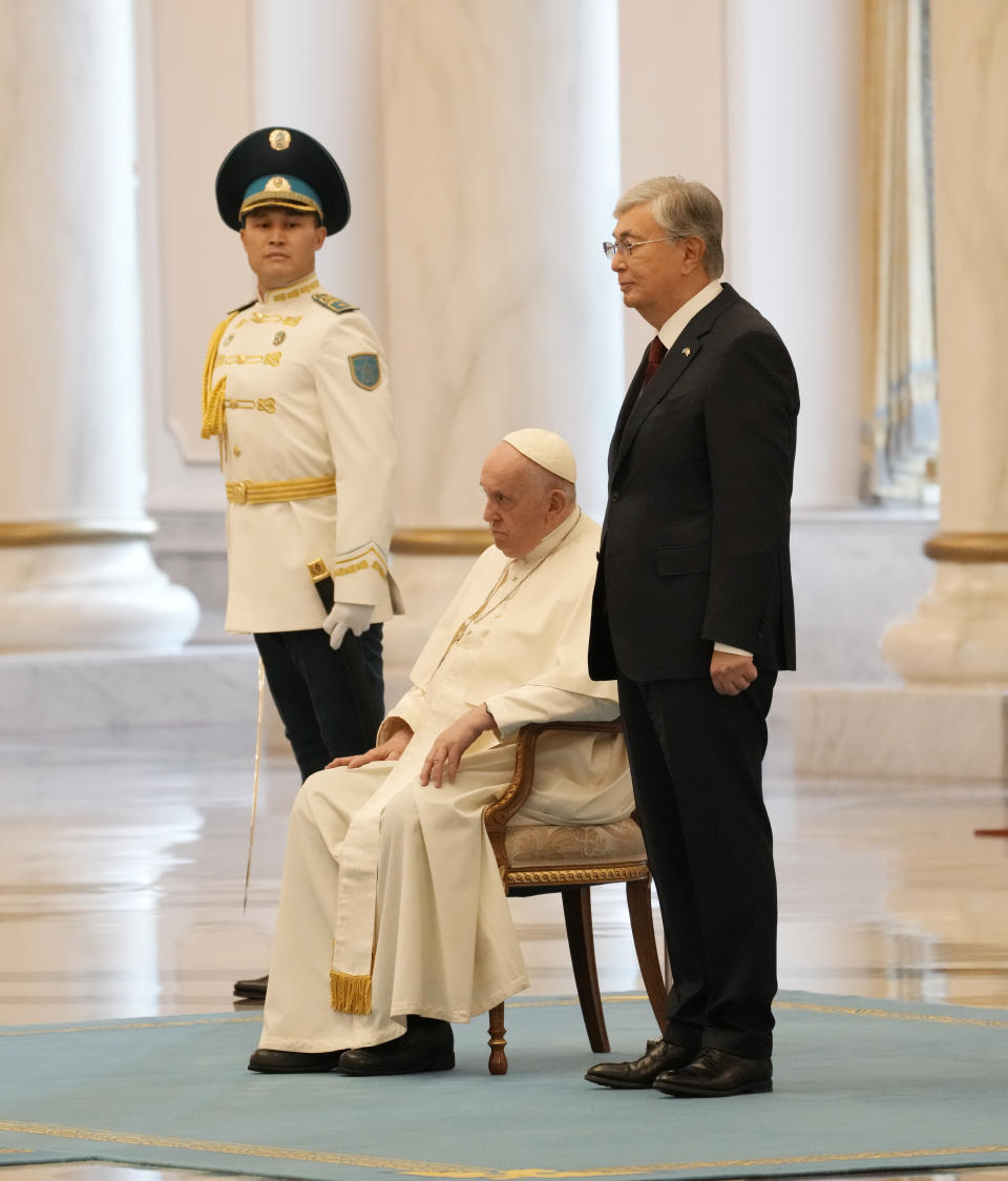 Pope Francis attends with Kazakhstan's President Kassym-Jomart Tokayev the welcome ceremony at the Presidential Palace Ak Orda, in Nur-Sultan, Kazakhstan, Tuesday, Sept. 13, 2022. Pope Francis begins a 3-days visit to the majority-Muslim former Soviet republic to minister to its tiny Catholic community and participate in a Kazakh-sponsored conference of world religious leaders. (AP Photo/Andrew Medichini)