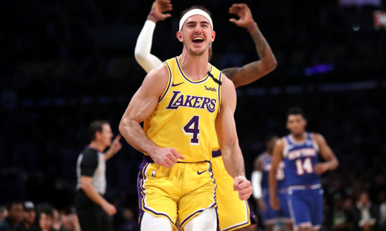 The Lakers' Alex Caruso celebrates during a game against the Knicks.