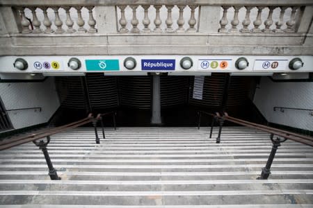 A closed entrance at the Republique metro station is seen during a strike by all unions of the Paris transport network (RATP) against pension reform plans in Paris