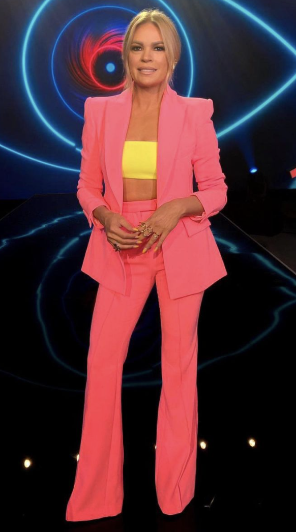 Sonia Kruger in pink Alex Perry suit and yellow Versace bandeau top