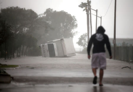 A truck is seen turned over as Hurricane Irma passes south Florida, in Miami, U.S. September 10, 2017. REUTERS/Carlos Barria