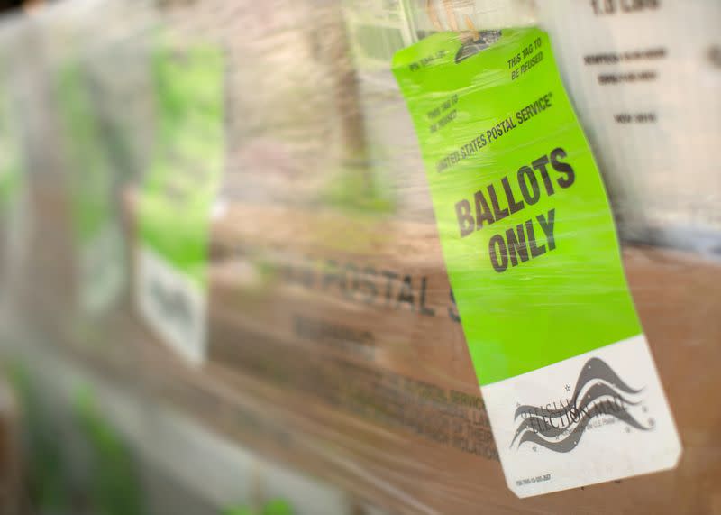 FILE PHOTO: Mail-in Ballots shipped from Orange County Registrar of Voters to U.S. Post Office for delivery