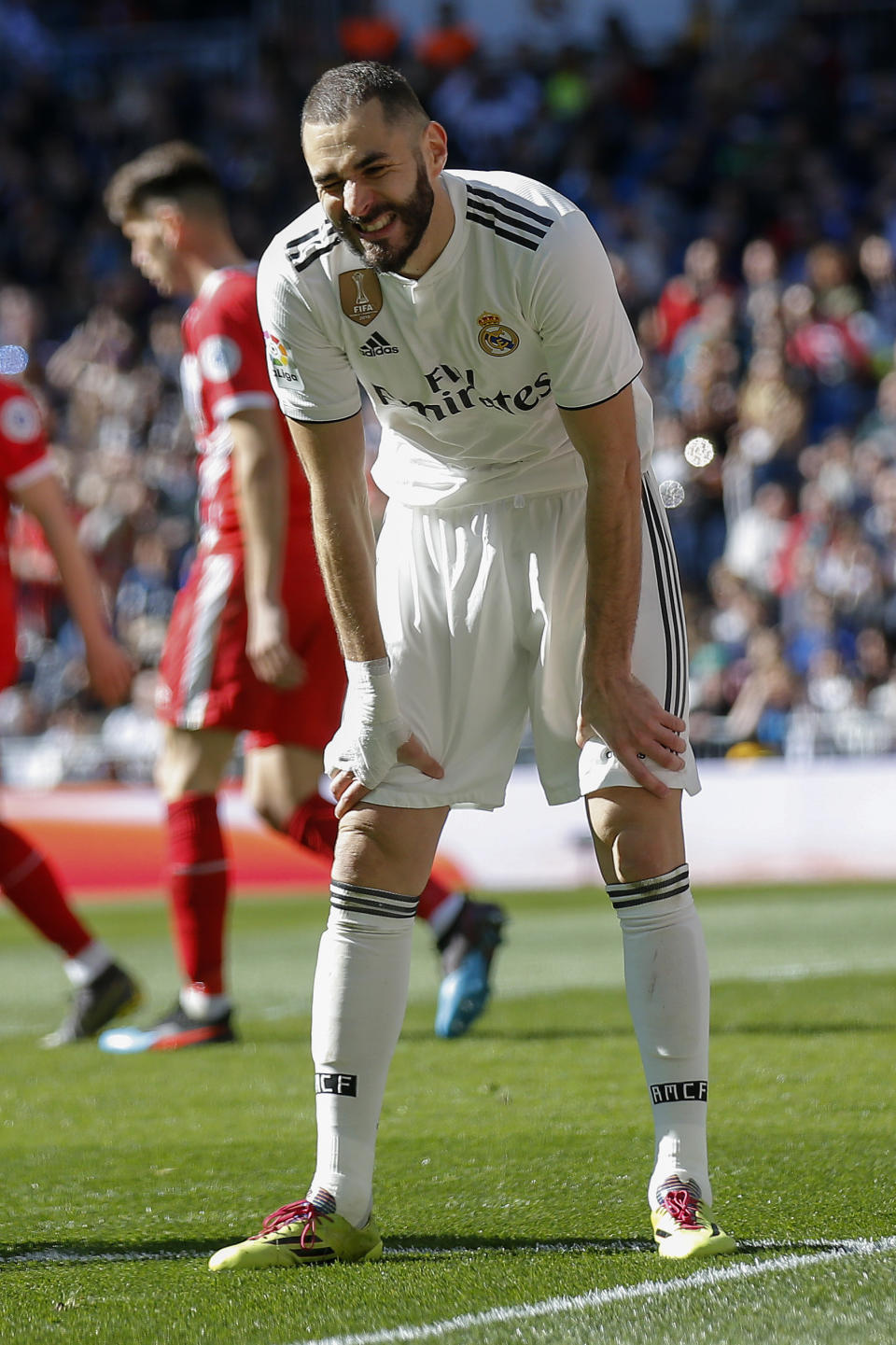 Real Madrid's Karim Benzema gestures after failing to score during a La Liga soccer match between Real Madrid and Girona at the Bernabeu stadium in Madrid, Spain, Sunday, Feb. 17, 2019. (AP Photo/Andrea Comas)