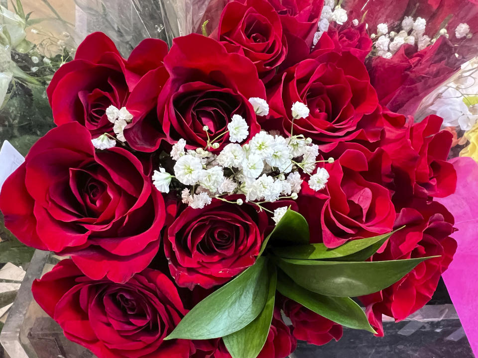 This Feb. 1, 2023, photo provided by Jessica Damiano shows a bouquet of roses for sale in Old Brookville, NY. According to the ASPCA, roses are among the nontoxic gift flowers that are safe to display around pets. Still, the organization warns, their thorns could pose a hazard. (Jessica Damiano via AP)