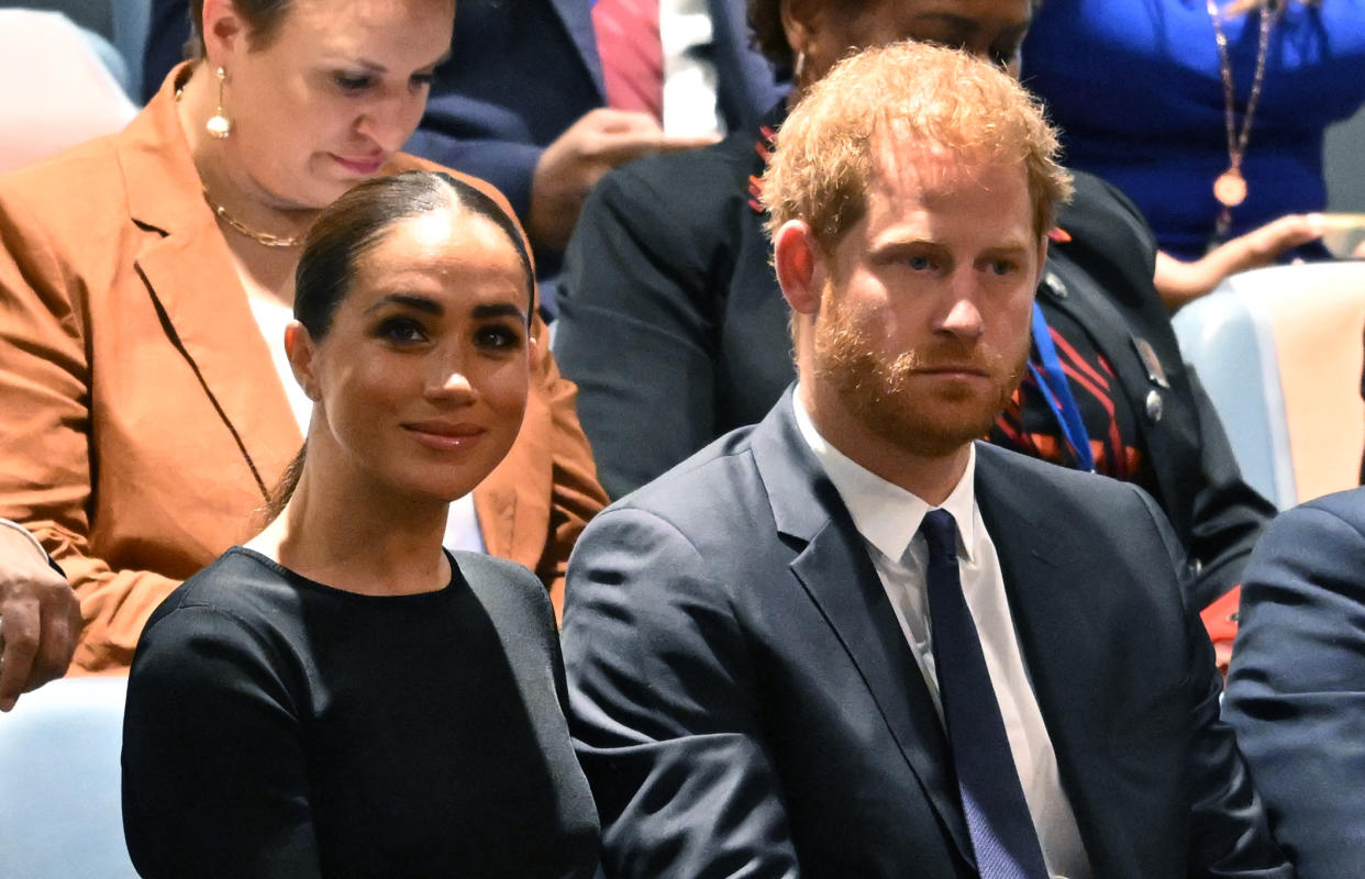 Prince Harry (R) and Meghan Markle (L), the Duke and Duchess of Sussex, attend the 2020 UN Nelson Mandela Prize award ceremony at the United Nations in New York on July 18, 2022. - The Prize is being awarded to Marianna Vardinoyannis of Greece and Doctor Morissanda Kouyate of Guinea. (Photo by TIMOTHY A. CLARY / AFP) (Photo by TIMOTHY A. CLARY/AFP via Getty Images)