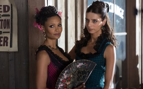 Thandie Newton as Maeve and Angela Sarafyan as Clementine in Westworld - Credit: HBO